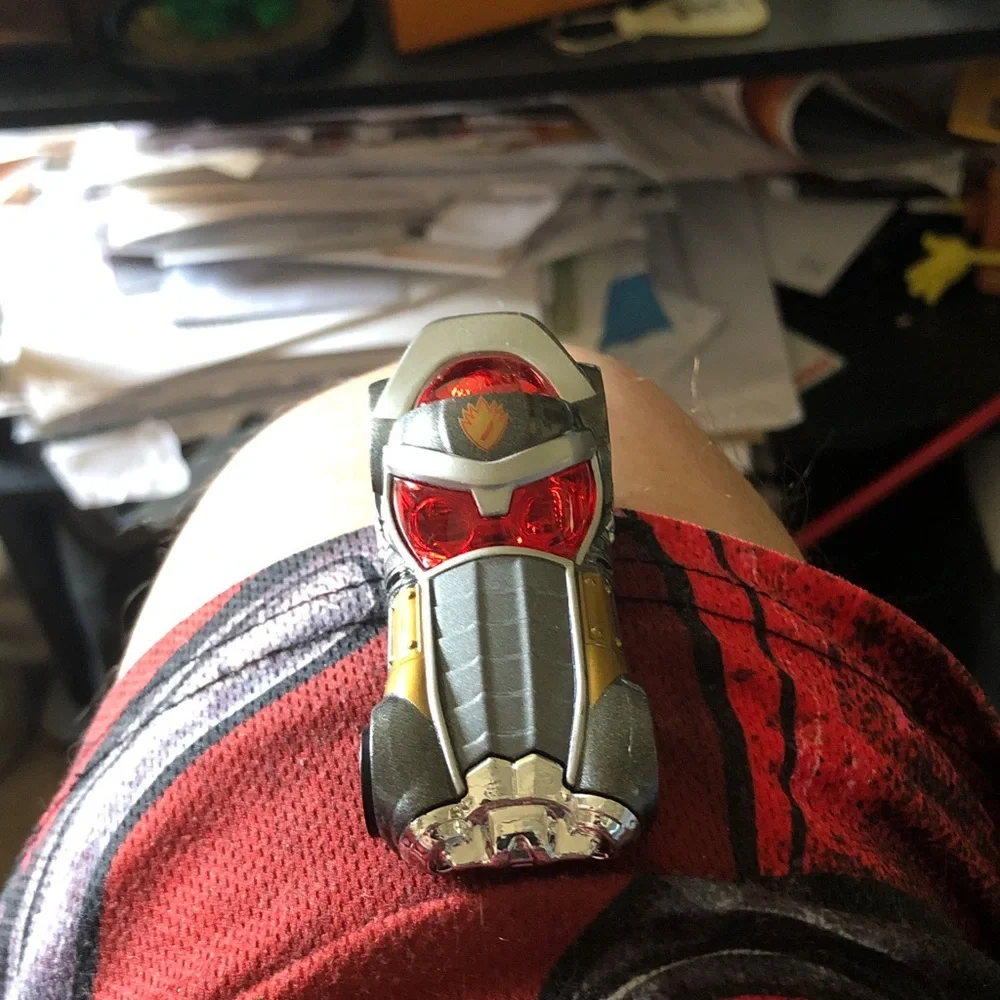 Red and Silver Toy Vehicle Capsule